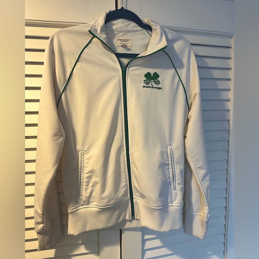 Vintage American Eagle athletic jacket with embroidered shamrock.